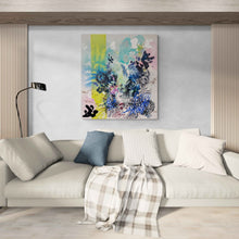 Load image into Gallery viewer, Burn original painting by Tania LaCaria displayed hanging in a living room with a beige sofa, white pillows and one blue accent pillows and a reeded wood accent wall.