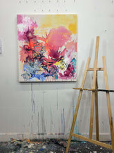 Load image into Gallery viewer, Good Start original painting by Tania LaCaria displayed hanging on a white wall in the artist's studio with a wood easel in the foreground