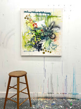 Load image into Gallery viewer, Enouement by Tania LaCaria - painting hanging on a white wall in the artist's studio..